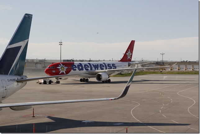 airplane,jet,Calgary Airport,Westjet,YYC,Edelweiss Air HB-101,Airbus A330-200 