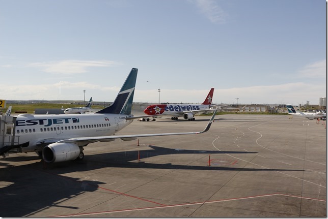 airplane,jet,Calgary Airport,Westjet,YYC,Edelweiss Air HB-101,Airbus A330-200 