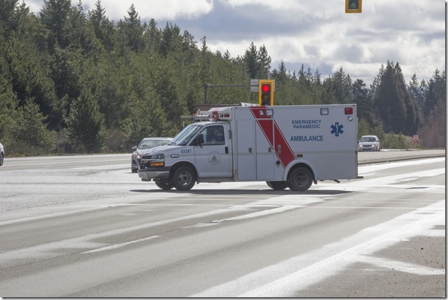 emergency vehicles,RCMP,acidient,ambulance,Highway 19,Horne Lake Road,tow truck