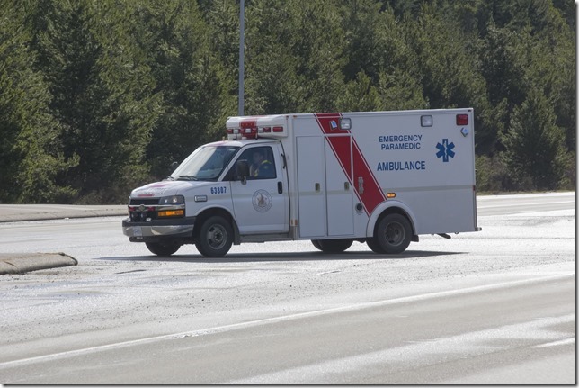 emergency vehicles,RCMP,acidient,ambulance,Highway 19,Horne Lake Road,tow truck