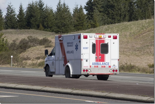 emergency vehicles,RCMP,acidient,ambulance,Highway 19,Horne Lake Road,tow truck