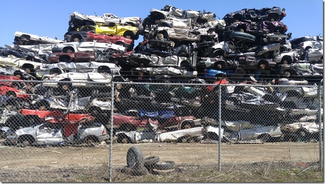 crushed cars,recyling,automobile recycling facility,scrap metal