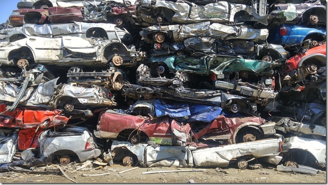 crushed cars,recyling,automobile recycling facility,scrap metal