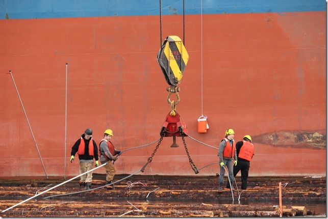 stevedores,ships,logs,Nanaimo Assembly Wharf,Nanaimo,log boom,dozer boat