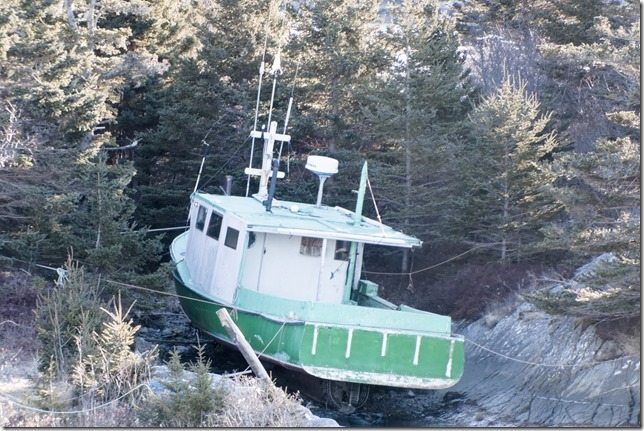 A lobster fishing boat high and dry on the north shore of Jenkins Island