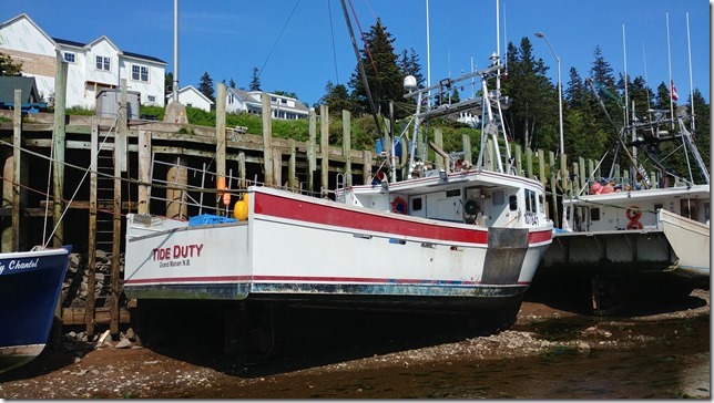 The fishing boat Tide Duty in Halls Harbour at low tide
